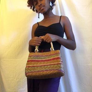 Colorful woven bamboo handle handbag